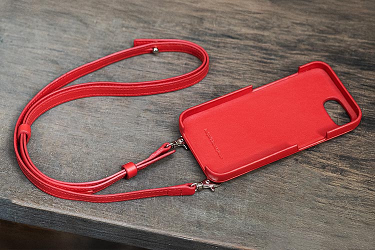 Apple iPhone 16e shell with shoulder strap